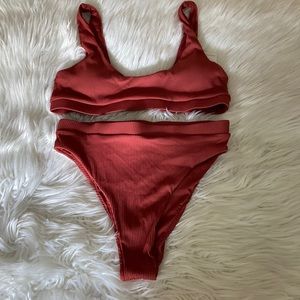 Blushing Brunette Boutique swimsuit top is size L and bottoms  size M brand new